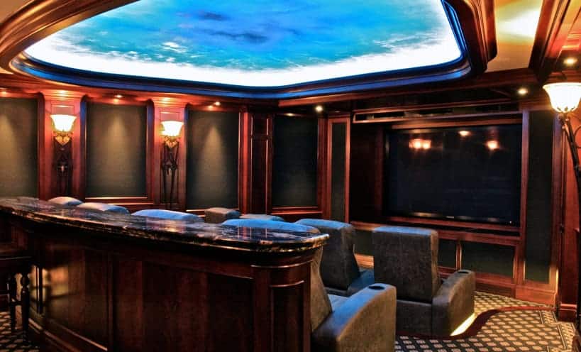 Elegant home theater with a large screen and sky ceiling by Atlantic AV.