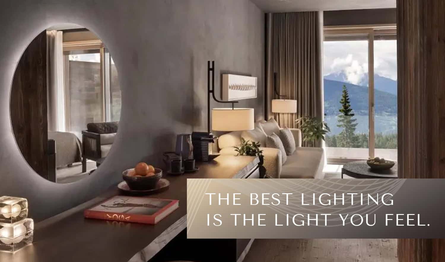 Elegant hotel room with large window overlooking mountains and cozy lighting.